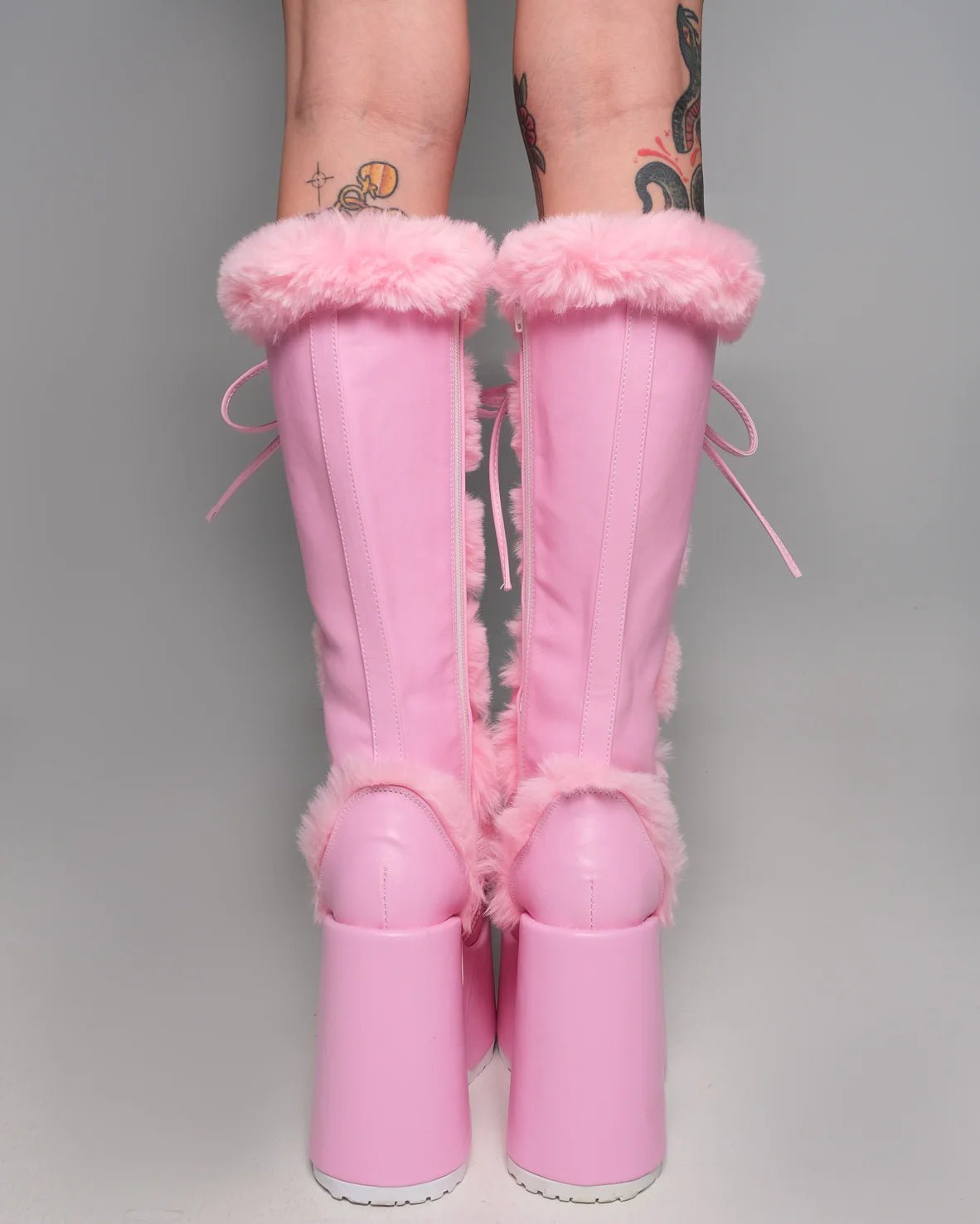 Demonia Pastel Pink Furry Winter Faux Fur Boots - InstaWOW Shop